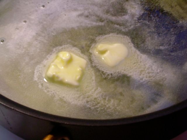 Butter in mushroom skillet