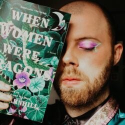 dramatic green and purple eye make-up with book cover of WHEN WOMEN WERE DRAGONS